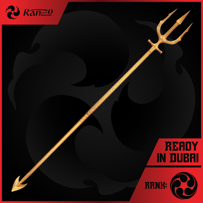 Aquaman Trident of King Atlan replica in gold, three prongs at the top and an arrow tip at the base